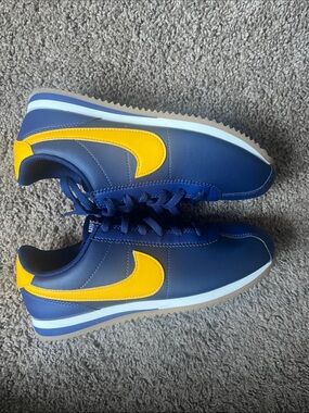 Nike Kids Navy Sneakers with Bright Yellow Swoosh Cortez